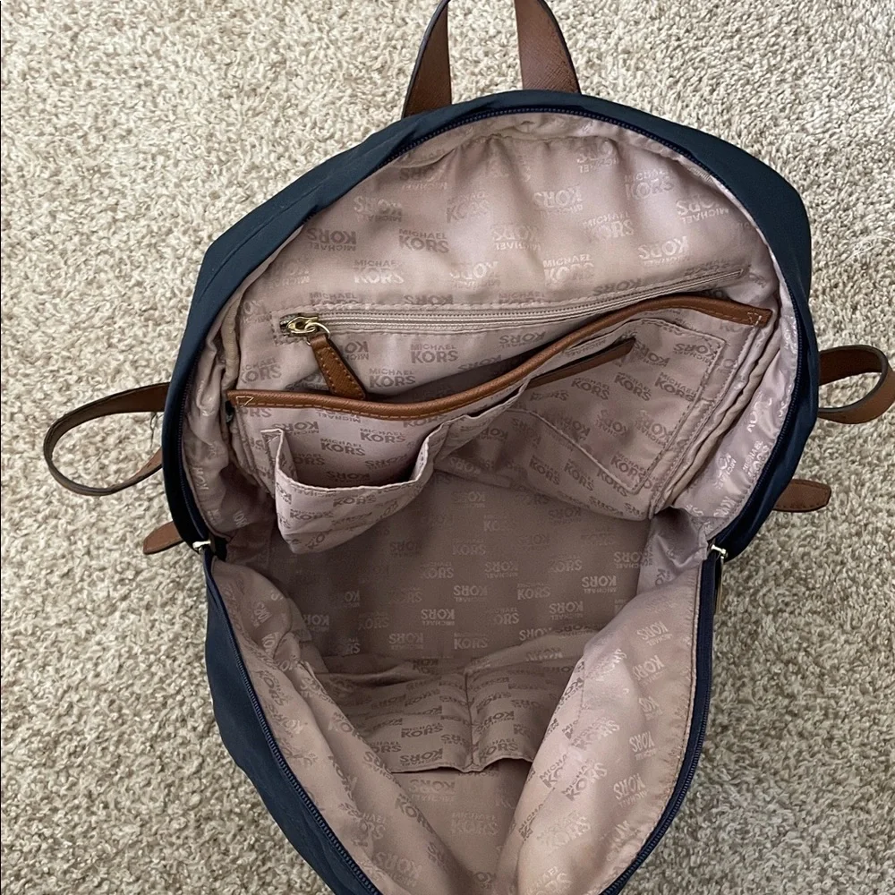 Elegant Michael Kors Navy and Tan Backpack